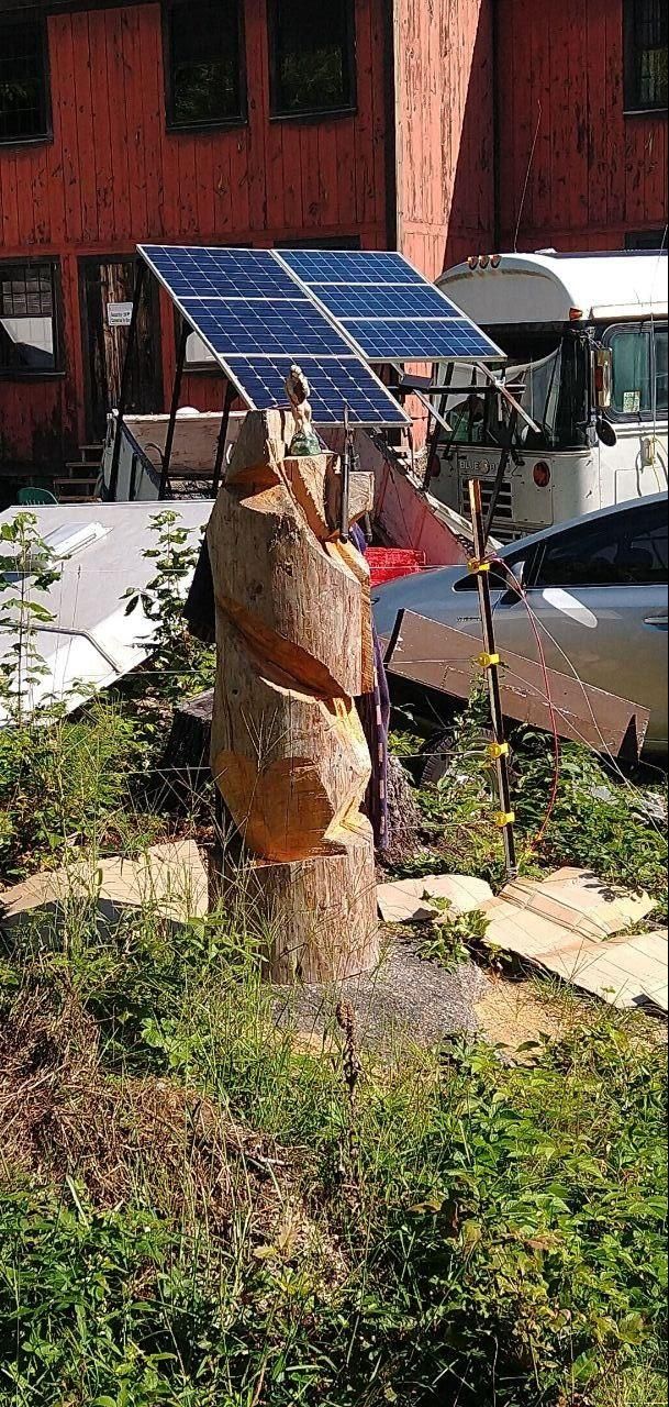 carved wooden bear by the garden at Bartertowne, Canaan New Hampshire