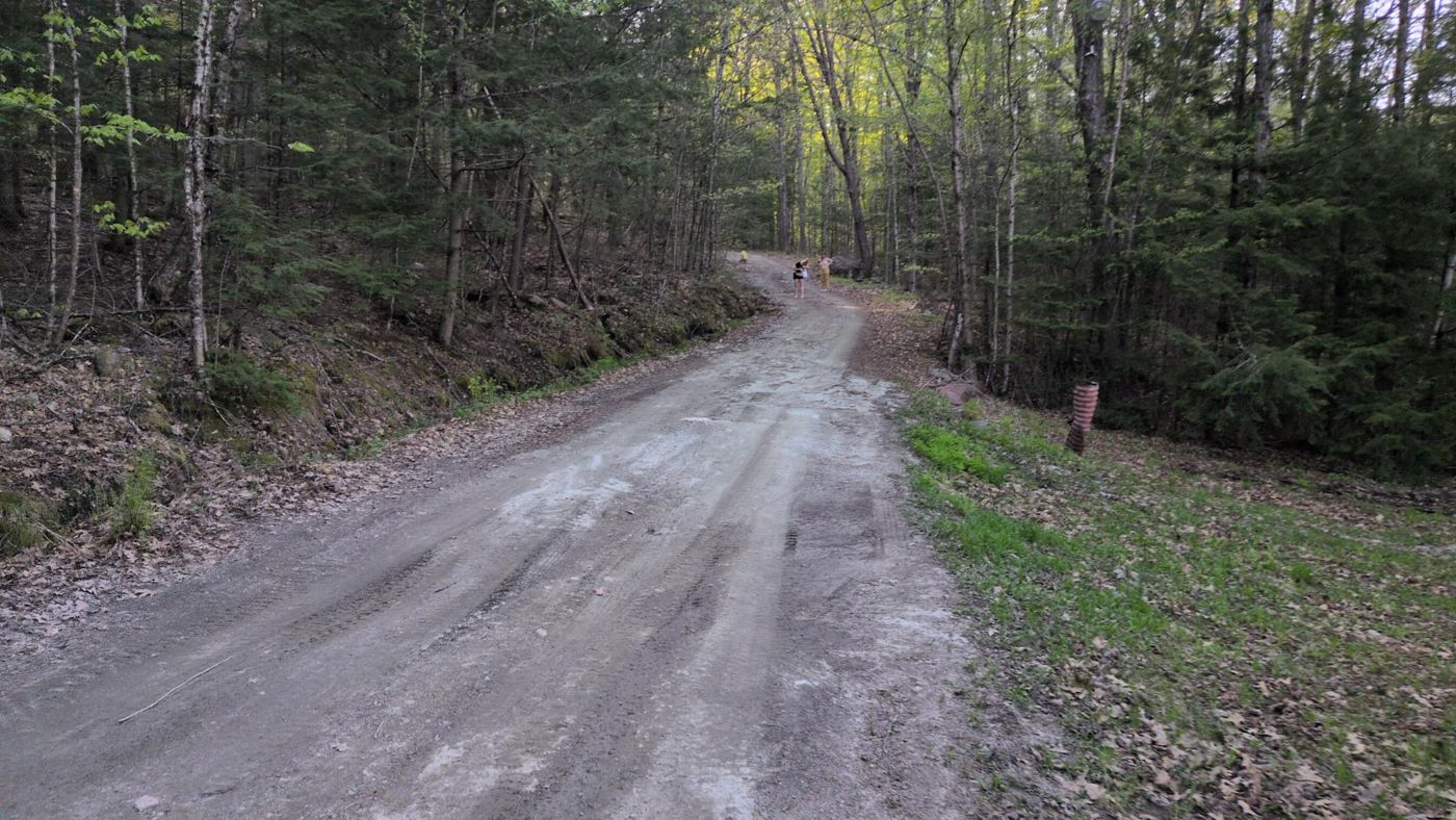 evening stroll down the wooded camp road at Bartertowne, Canaan New Hampshire